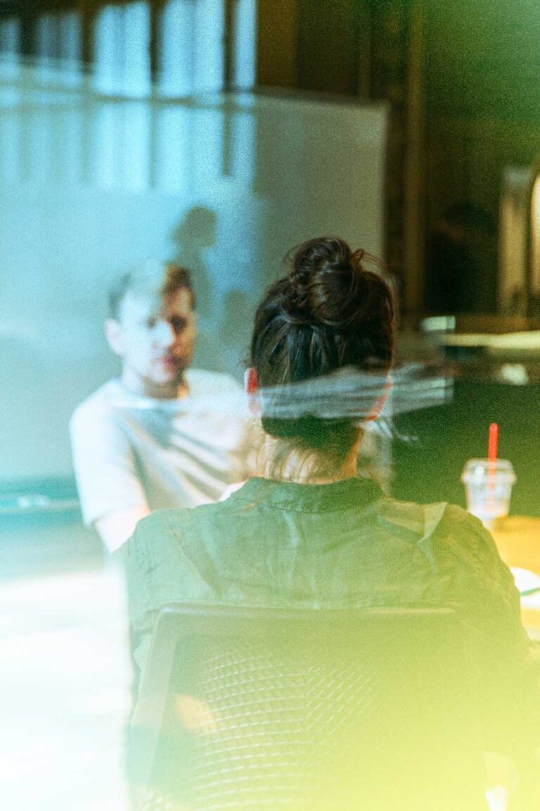 Woman talks with her colleague in the office